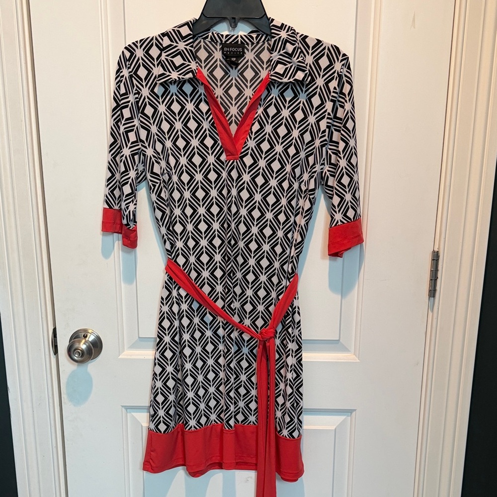 Black & White Geometric Wrap Dress with Orange Trim